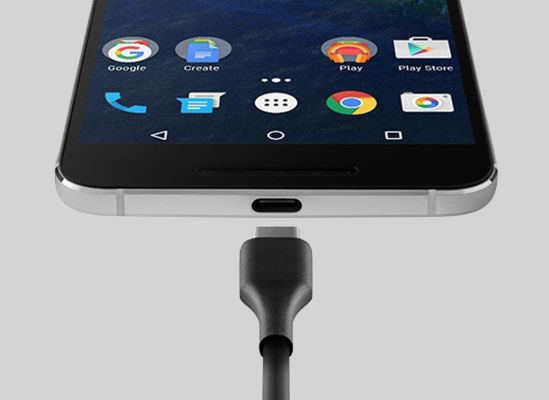 A close shot of a smartphones USB Type C port.