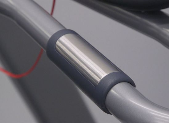 Closeup photo of a hand-rail heart-rate monitor.