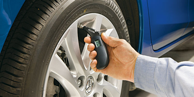 How do you determine the correct tire pressure for a truck?