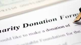 What is the history of the National Charities Information Bureau?