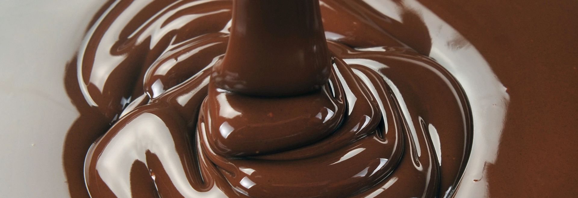 A pool of melted chocolate. Using the best baking chocolate is important when making holiday desserts.
