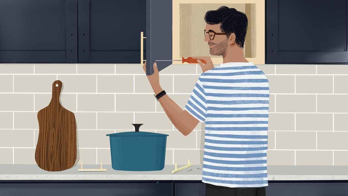 An illustration of a person changing the hardware on kitchen cabinets.