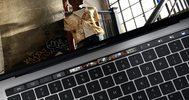 The new Touch bar displaying additional controls on a Macbook Pro