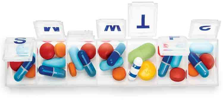 Medication errors. Image of pill organizer.