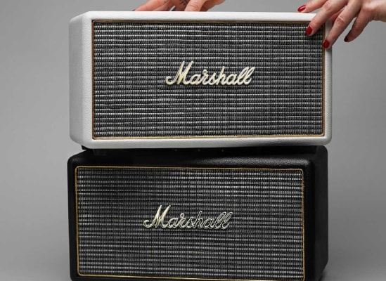 Photo of two Marshall wireless speakers stacked on top of each other.