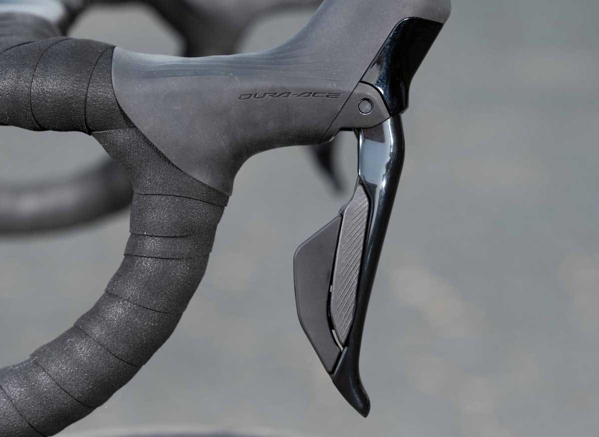 detail of Shimano brifter on bike handlebars