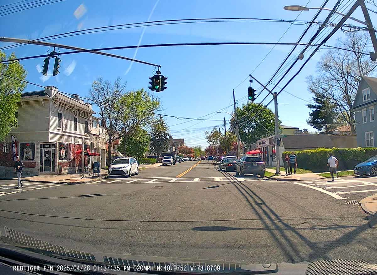 View of an intersection at daytime from the Redtiger 4k dashcam.