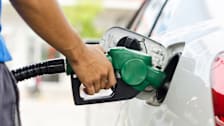 person pumping gas
