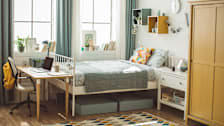 Well organized and decorated dorm room.