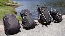 four black hiking backpacks