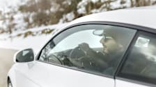 Man driving a car in the winter