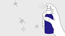 Hand spraying bug spray