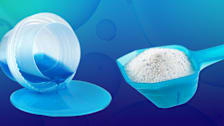 liquid laundry and powdered laundry detergent on blue background with bubbles