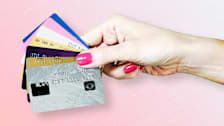 Hand holding credit cards