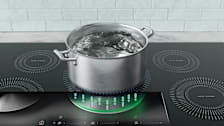 Pot on induction stove showing how technology works