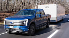 Ford F-150 Lightning towing a heavy trailer