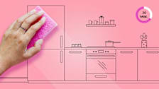 Hand using a sponge to scrub over an illustration of a pink kitchen.