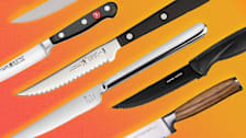 six steak knives on orange background