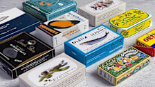 colorful packages of tinned fish