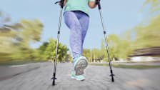 A person using walking sticks.