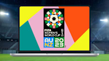 FIFA Women's World Cup logo on laptop screen with soccer field in background