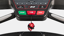 detail of Sole F80 treadmill safety stop button and safety key