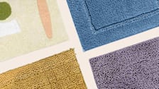 Clockwise from top right: Lands' End Premium Supima Cotton Non-skid Bath Rug, Amazon Basics Non-Slip Microfiber Shag Bathroom Rug Mat, Grandaily Chenille Striped Bathroom Rug Mat, and Cold Picnic Cliffside bath mat