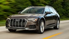 An Audi A6 on a road.