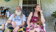 Crystal and Tim Dotson, of Corinth, Mississippi in front of their house.