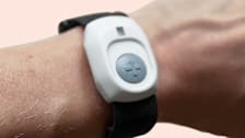 person wearing BayAlarm Medical medical alert device on wrist.