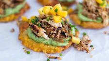 Close-up of Chicken Vaca Frita Tostones with Avocado Crema and Mango Salsa