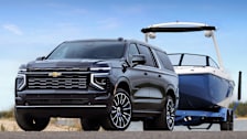 2025 Chevrolet Suburban towing a boat