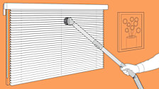 illustration of person using vacuum dusting attachment to clean window blinds