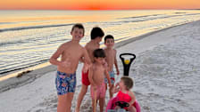 five children at the beach