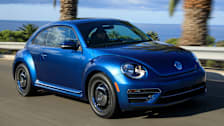 2018 Volkswagen Beetle driving along water