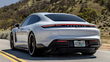 2024 Porsche Taycan driving, rear