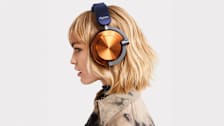 Woman wearing Dyson OnTrac headphones