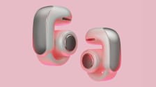 Bose Open earbuds on pink background