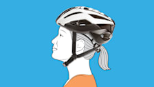 An illustration of a woman wearing a properly fitted bike helmet