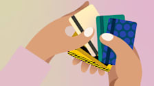 illustration of hands holding various credit cards