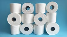 Stacks of toilet paper rolls
