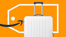 Amazon logo pointing to luggage inside of a price tag graphic.