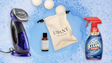 Conair Turbo steamer, L'Avant laundry oil and balls, OxiClean spray on soap suds background