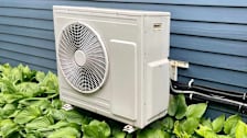Heat pump next to house