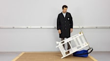 Juan Alberto Arguello Garcia Pertusa (Test Program Leader, Product Safety and Sustainability at Consumer Reports) performing a stability test on a Kitchen Toddler Tower with a 35 pound weight.