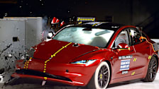 2025 Tesla Model 3 undergoing the IIHS passenger-side small overlap front test.