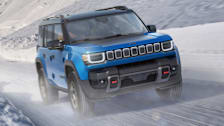 2026 Jeep Recon Electric SUV driving on a snowy road