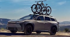 2026 Toyota bZ Woodland driving with bikes on the roof