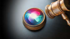 Photo illustration of the Siri icon on the  block of a gavel.