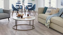 a living room with Stainmaster Barnes Oak LSM02-920 flooring